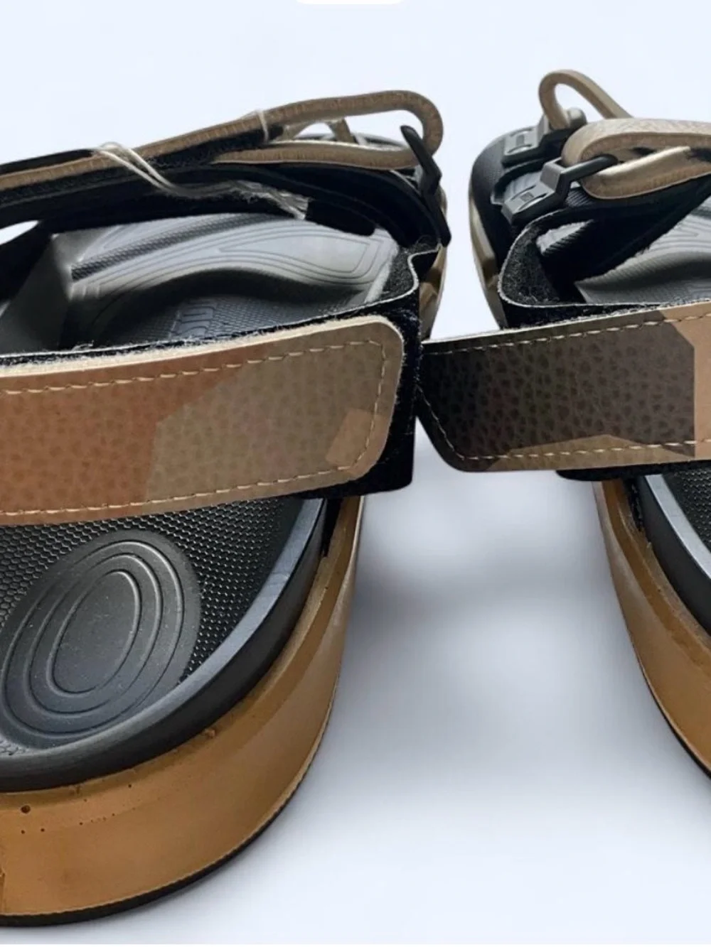 Birkenstock Men’s Black Slides with Tan Accent Strap